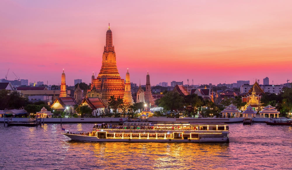 Wat Arun and cruise ship in twilight time