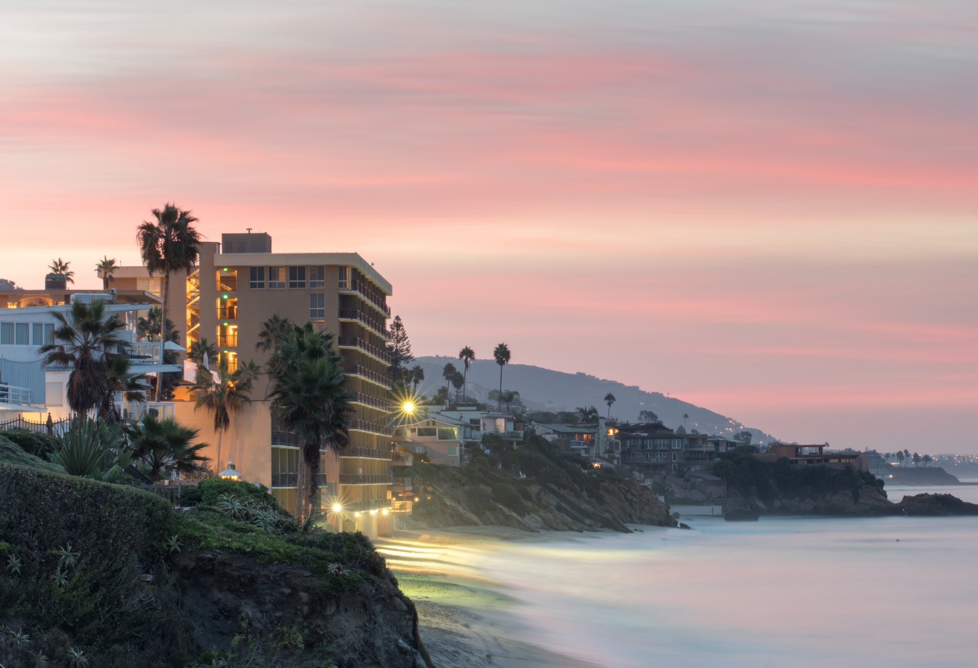 Landscape view of cliffs and beach at dawn, Laguna Beach, California, USA