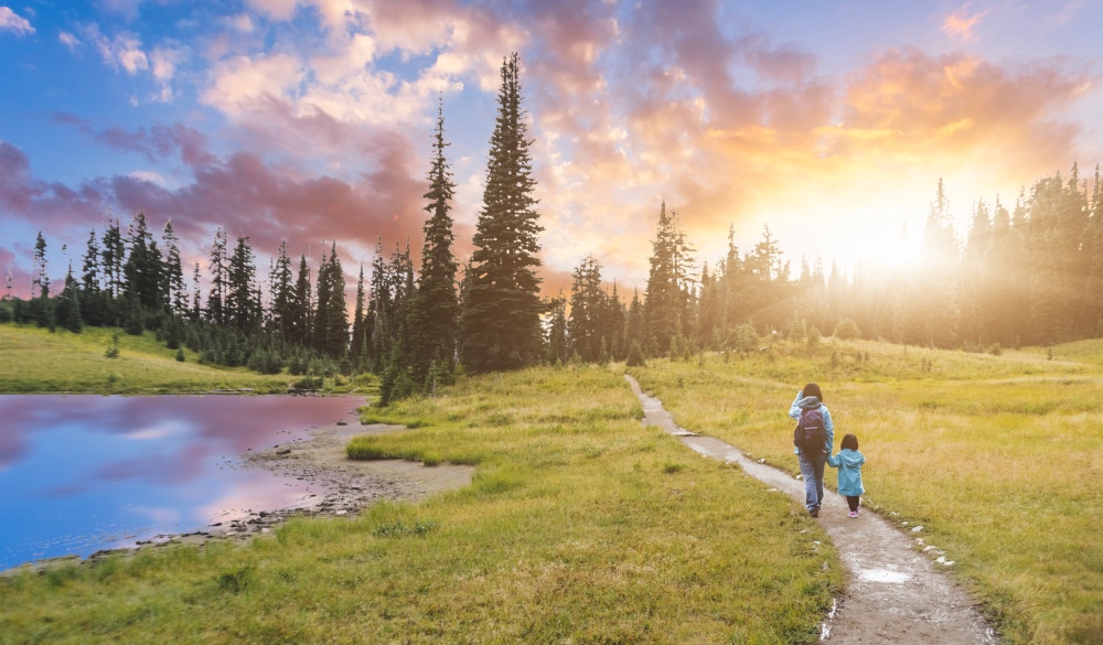 mother hiking with daughter at MT.Rainier