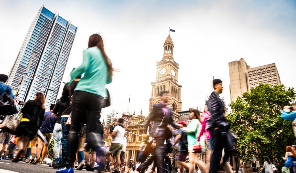 Sydney downtown, blurred intersection people and traffic