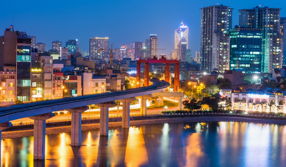 Aerial view of Hanoi cityscape by twilight period, with Dong Da lake and under construction Cat Linh - Ha Dong elevated railway