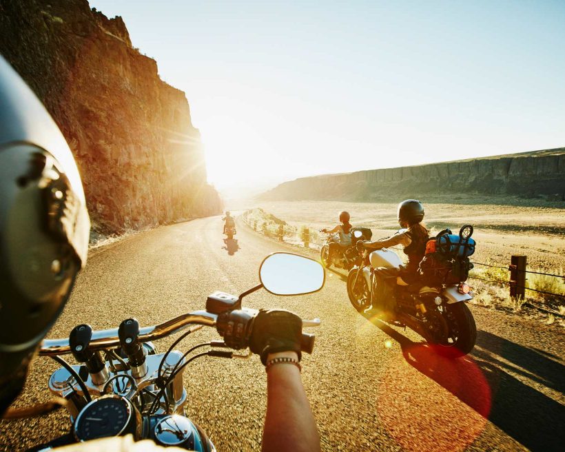 Group of female friends on motorcycle road trip