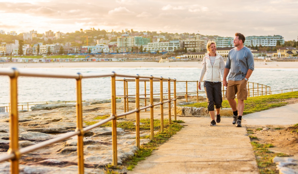 Happy Middle Aged Active Fit Healthy Beach Couple Walking Outdoors