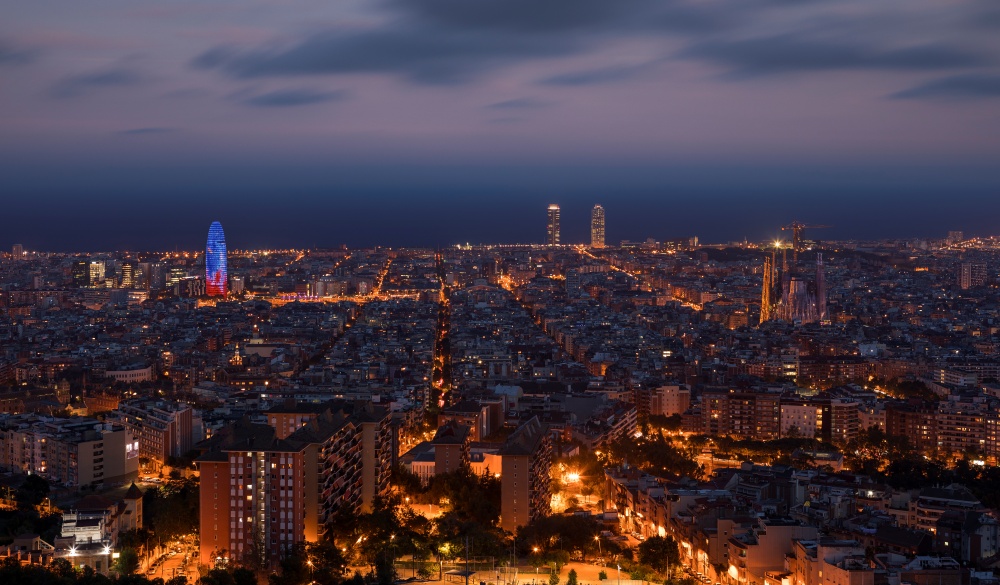 Illuminated skyline of Barcelona during night, Bunkers del Carmel"n