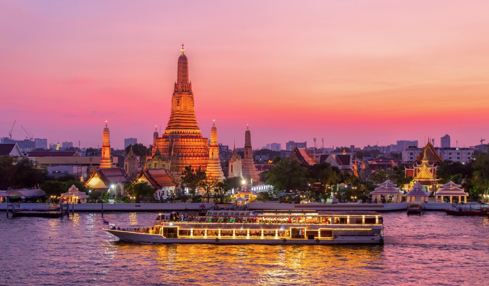Wat Arun and cruise ship in twilight time