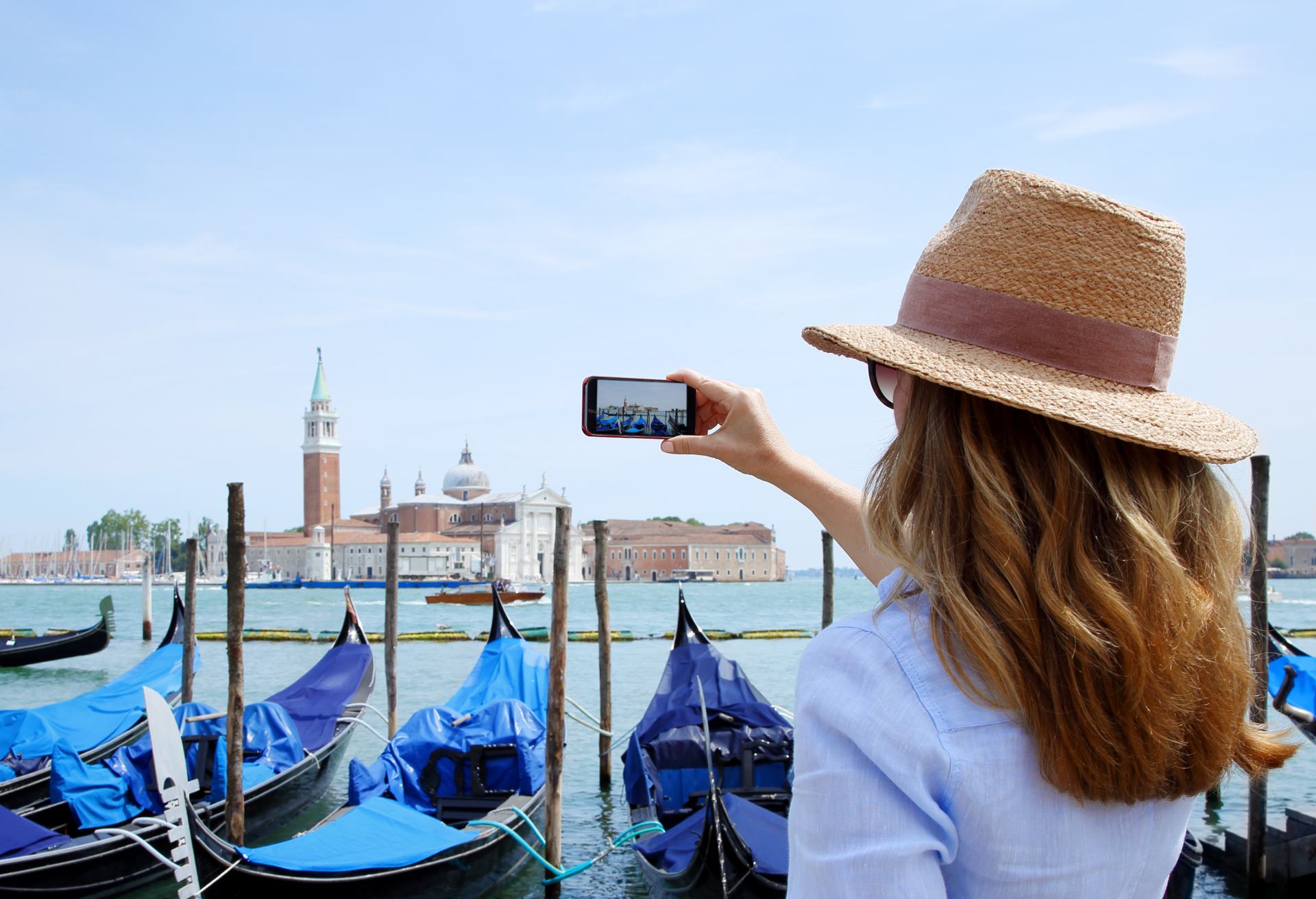 female tourist with mobile phone