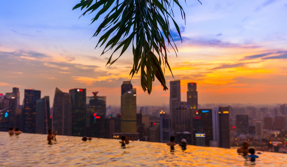Pool on roof and Singapore city skyline