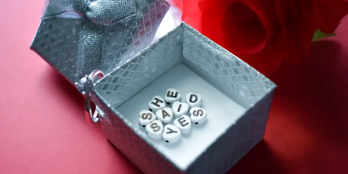 She said yes in heartshaped letters