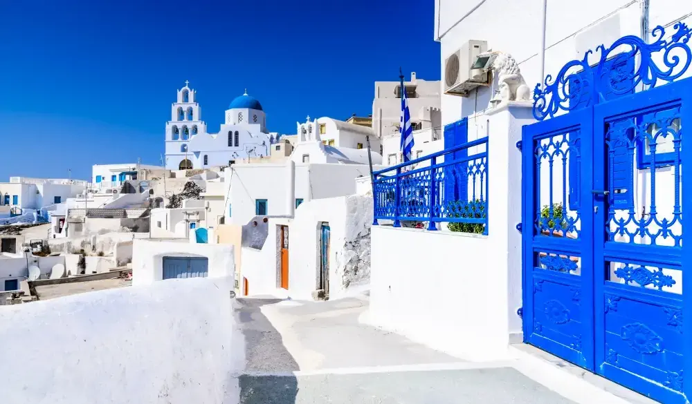 Pyrgos, Santorini, Greece. Famous attraction of white village with cobbled streets, Greek Cyclades Islands, Aegean Sea.; Shutterstock ID 738699298