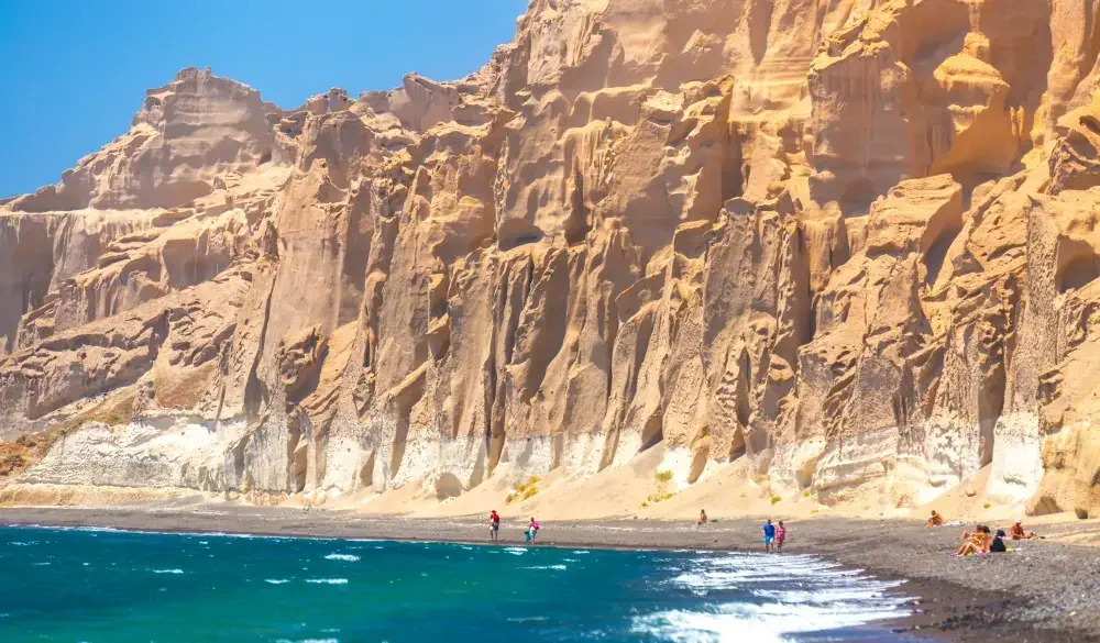Beautiful beach with volcanic mountains. Vlychada beach, Santorini island, Greece