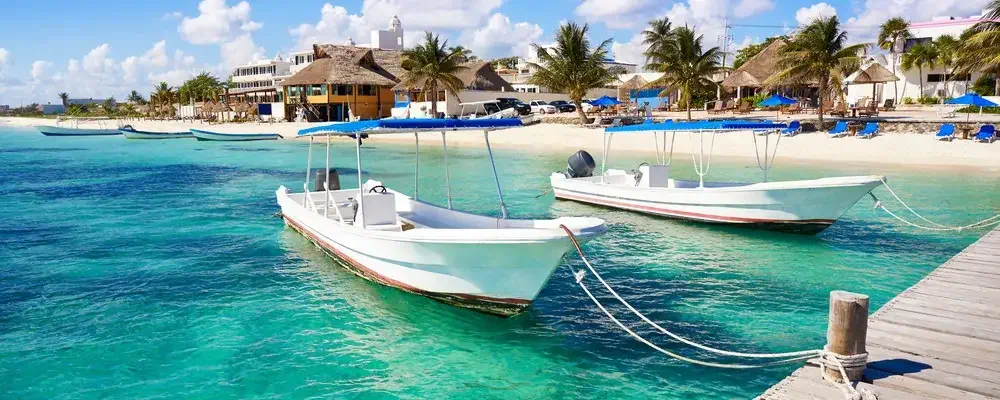 Puerto Morelos beach boats in Mayan Riviera Maya of Mexico