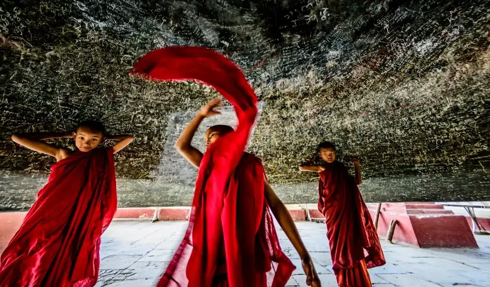 Asian monks dancing