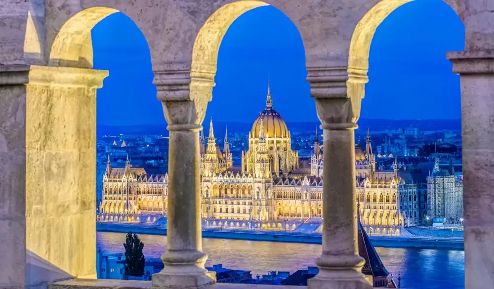 View of Parliament Building illuminated at dusk, Budapest, Hungary