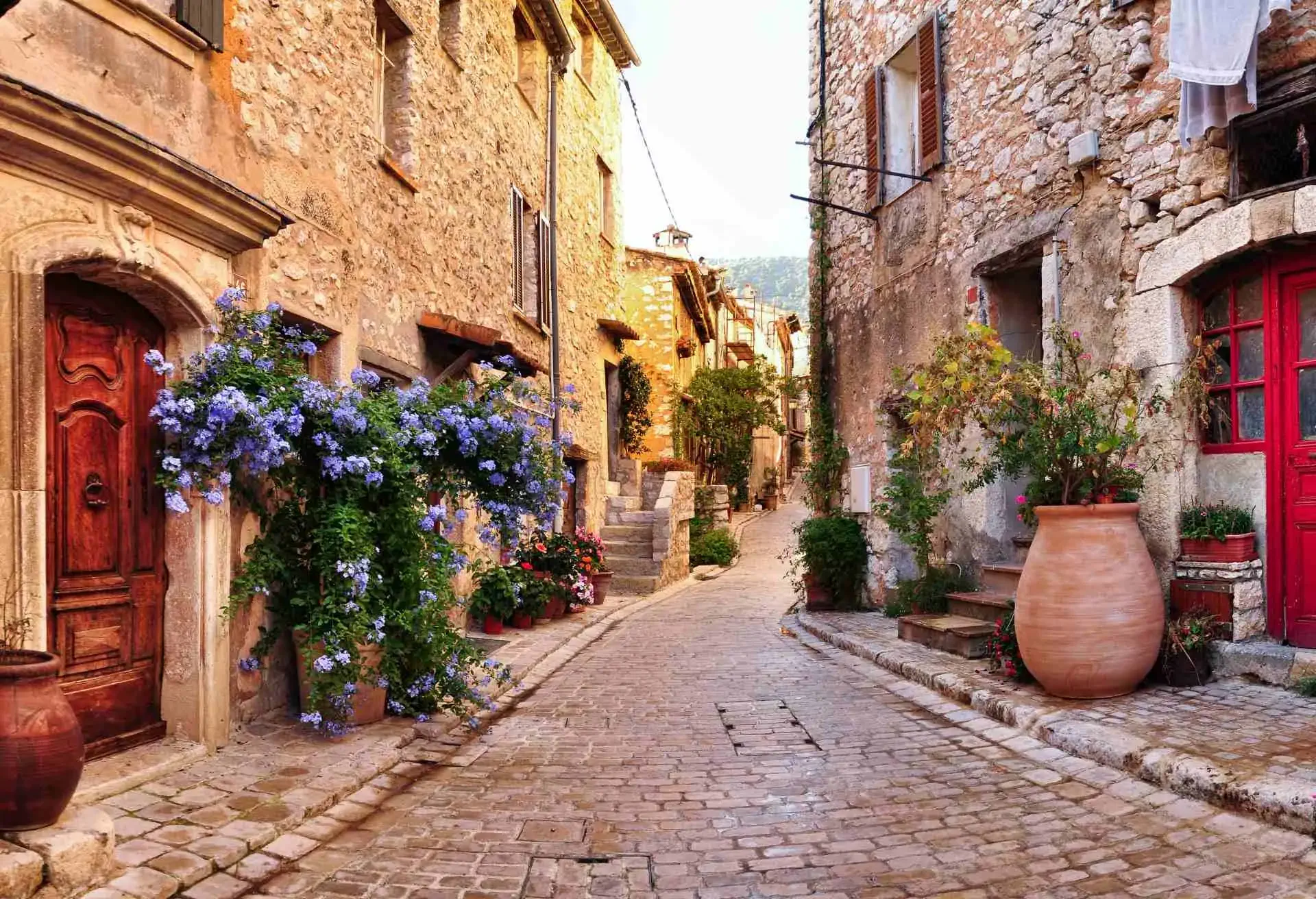 Old French village houses and cobblestone street